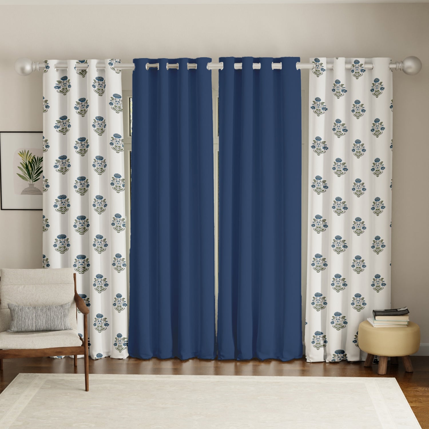 Set of four 7-foot cotton curtains with solid deep indigo panels and white panels featuring blue floral patterns.