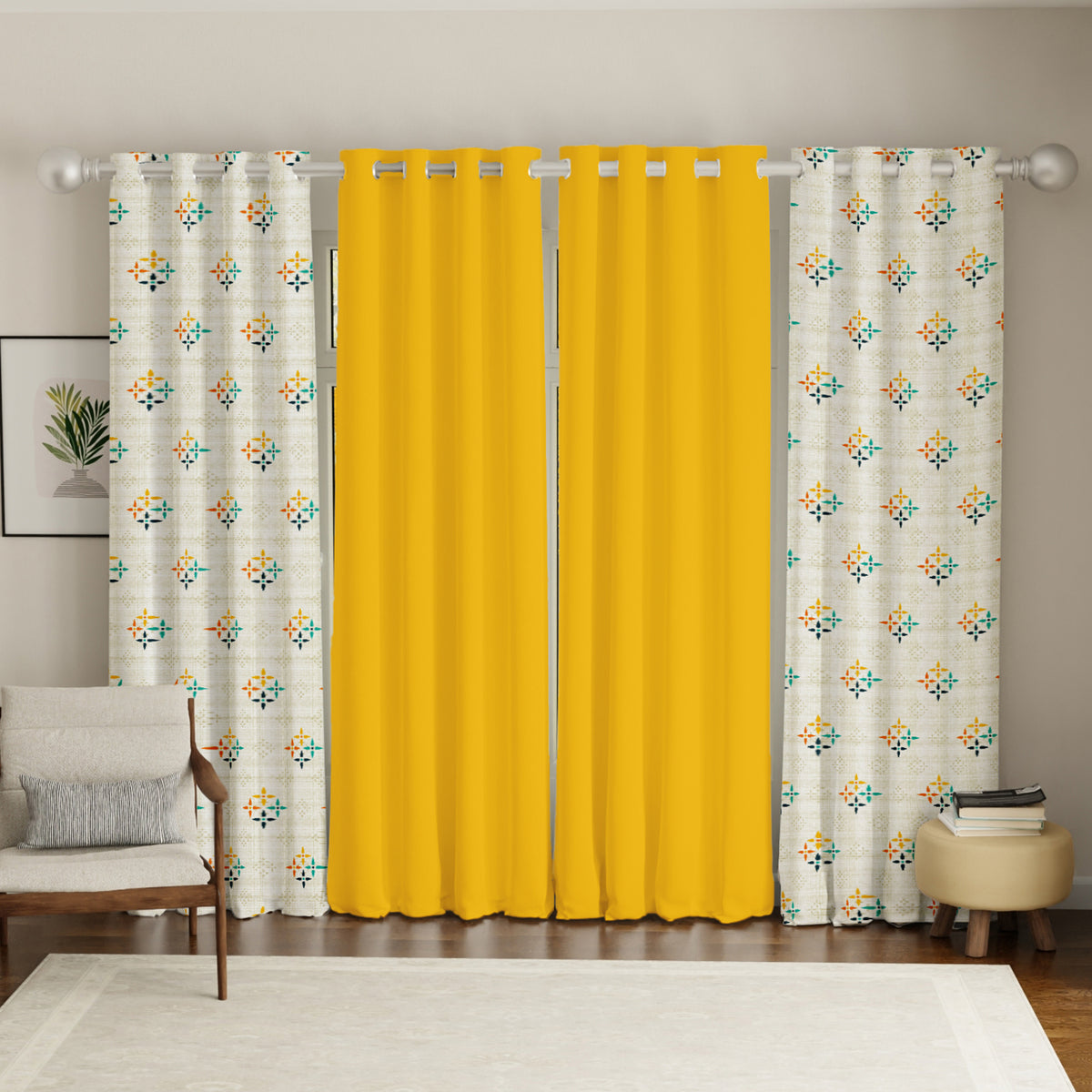 Set of four cotton curtains, two solid bright yellow and two patterned with yellow, teal, and white mosaic design,.