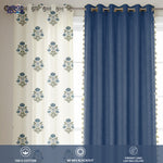 Set of three cotton curtains featuring two white panels with blue floral patterns and one solid navy blue room-darkening.